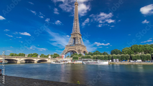 The Eiffel tower timelapse hyperlapse from waterfront at the river Seine in Paris