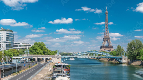Eiffel tower at the river Seine timelapse from bridge in Paris, France © neiezhmakov