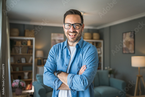 One adult man with eyeglasses stand at home happy smile