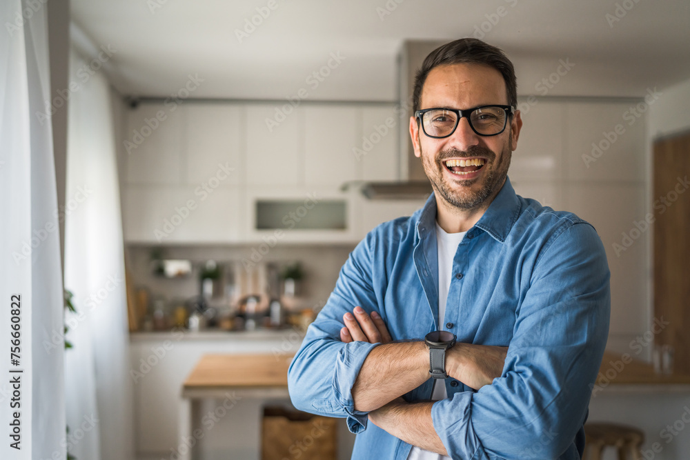 One adult man with eyeglasses stand at home happy smile One adult man with eyeglasses stand at home happy smile