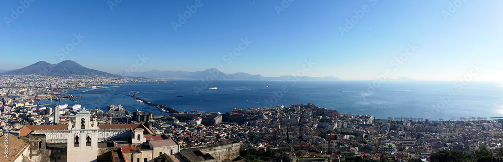 
Panoramic view city of Naples, the Gulf of Naples, the Vesuvius volcano and the island of Capri. Castel Sant'Elmo, medieval fortress located on Vomero Hill. The Certosa di San Martino. Naples. Italy