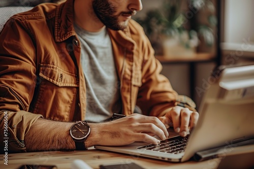 Man Working on Computer at Desk