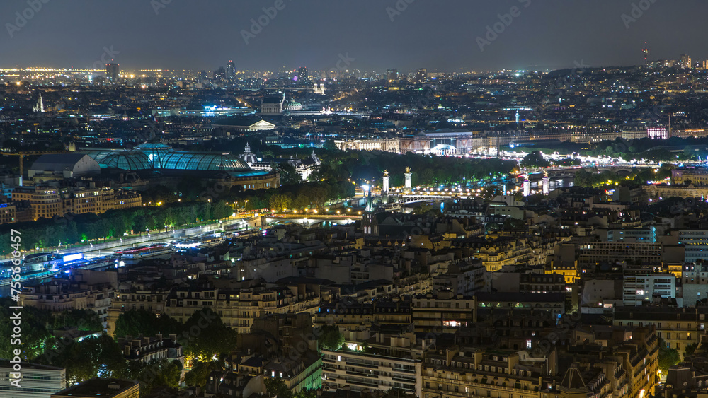 Aerial night timelapse view of Paris City and Seine river shot on the top of Eiffel Tower Aerial night timelapse view of Paris City and Seine river shot on the top of Eiffel Tower