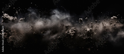 A dark sky filled with cumulus clouds releasing smoke, creating a mysterious and atmospheric midnight event. The black background enhances the dramatic meteorological phenomenon