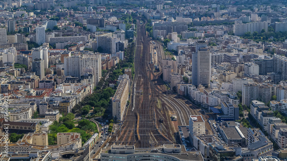 Fototapeta premium Top view of Paris skyline from observation deck of Montparnasse tower timelapse. Paris, France