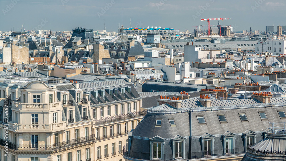 Cityscape view on the beautiful buildings timelapse from gallery lafayette terrace in Paris