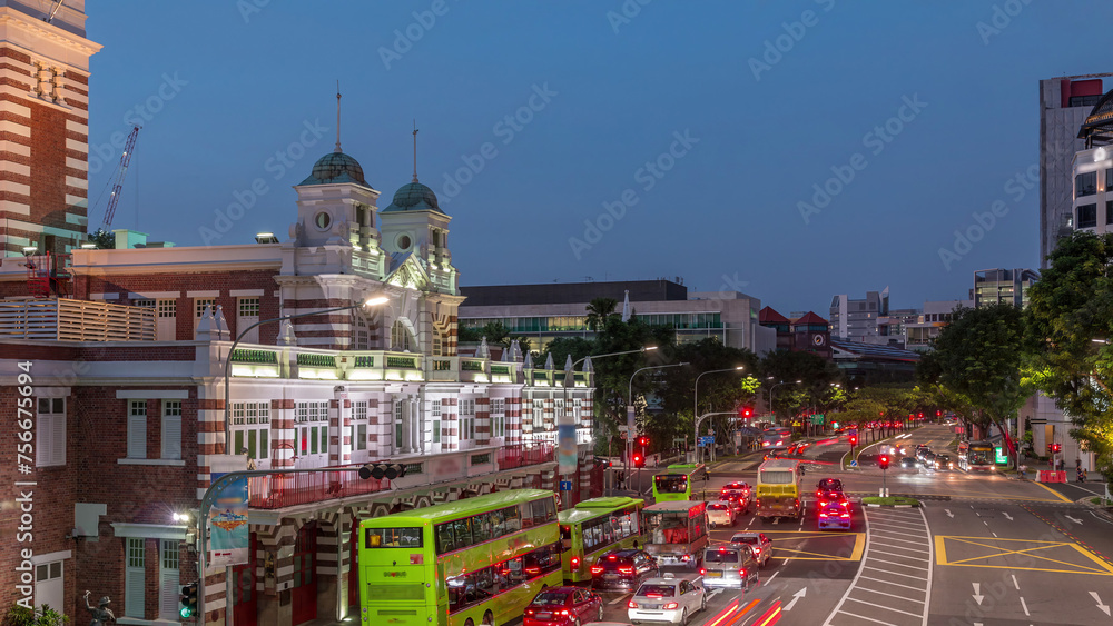 Αυτοκόλλητο Street traffic near the fire station of Singapore day to night aerial timelapse