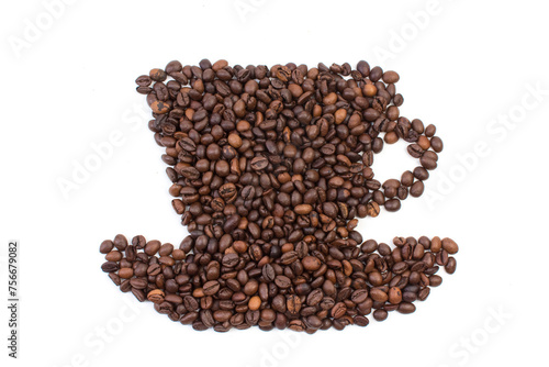 A pile of coffee beans in the shape of a coffee cup  on a white background. Top view.