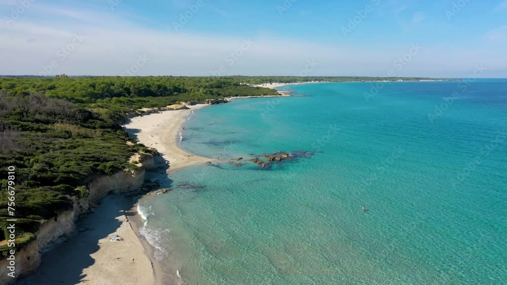 Aerial view of Baia dei Turchi, Puglia region, Italy. Turkish Bay (or Baia dei Turchi), this coast of Apulia is one of the most important ecosystems in Salento, Italy. Seacoast of Baia dei Turchi. Aerial view of Baia dei Turchi, Puglia region, Italy. Turkish Bay (or Baia dei Turchi), this coast of Apulia is one of the most important ecosystems in Salento, Italy. Seacoast of Baia dei Turchi.