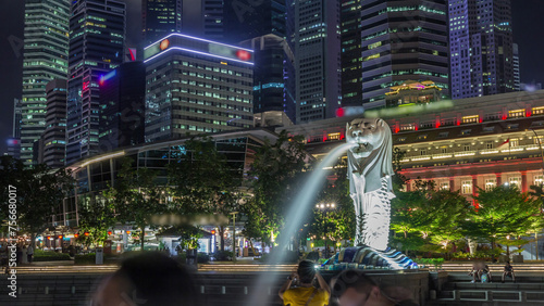 The Merlion fountain and Singapore skyline night timelapse hyperlapse.