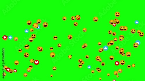 Various positive emojis, emoticon signs flying up over green background, chroma key. Reactions in social media application, social network concept.