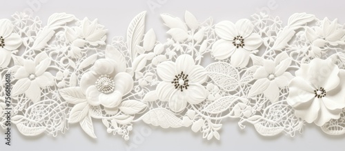 White lace pattern with vintage floral design for various uses.