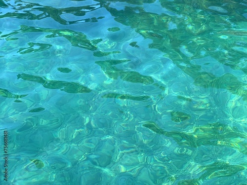 Sea water clear transparent surface.