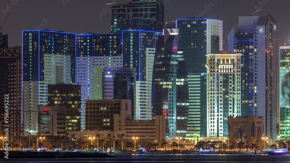 Obraz premium Doha skyscrapers in downtown skyline night timelapse, Qatar, Middle East
