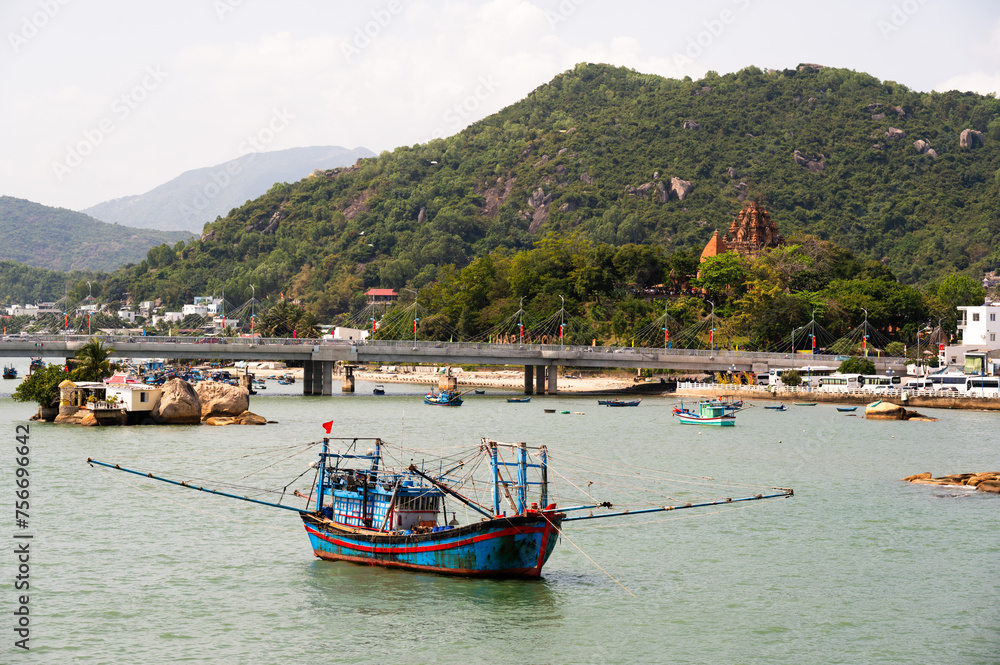 Boats on the River and Po Nagar temple in Nha Trang