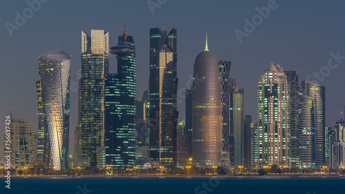Skyline of Doha night to day transition timelapse in Qatar