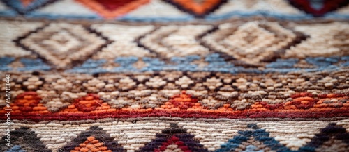 Close-up of vintage homemade carpets texture. © Lasvu