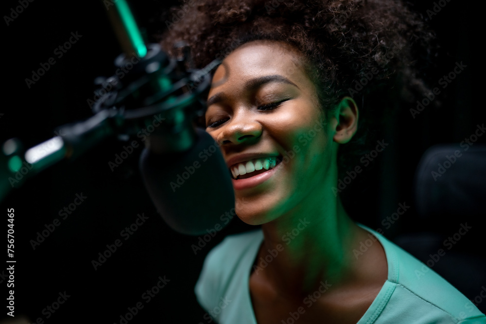 Obraz premium Young Podcaster Creating Content in Studio.