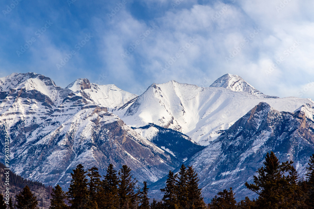 Snow-capped mountain peaks in the Canadian Rockies as seen from Banff National Park