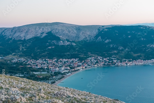 Scenic sunrise view of majestic coastline of Mediterranean Adriatic Sea near coastal town Baska, Krk Island, Primorje-Gorski Kotar, Croatia, Europe. Aerial vistas from idyllic hiking trail in summer
