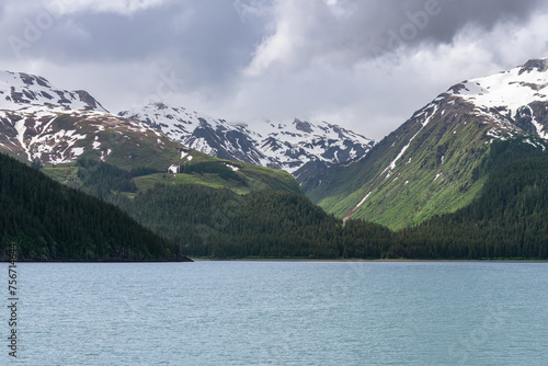 Sunlit snow capped mountains in favorite Channel, Alaska, USA © dvlcom