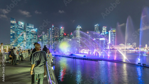 Photography Light and Water Show along promenade in front of Marina Bay Sands timelapse