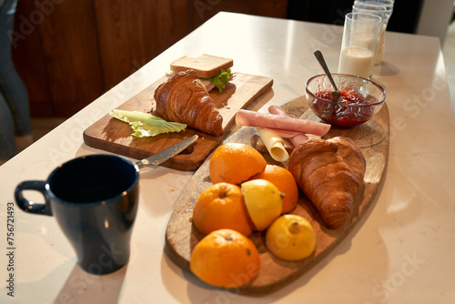 Breakfast on the kitchen table, a spread of morning delights waiting to be savored.