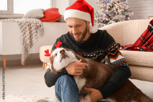 Handsome young man in Santa...