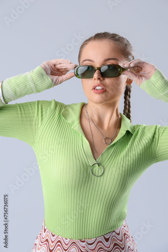 Beautiful young woman with ...