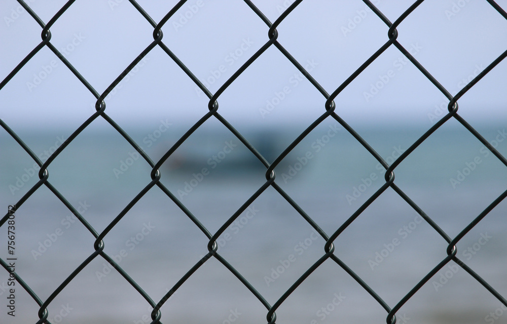 chain link fence with blue sky chain link fence with blue sky