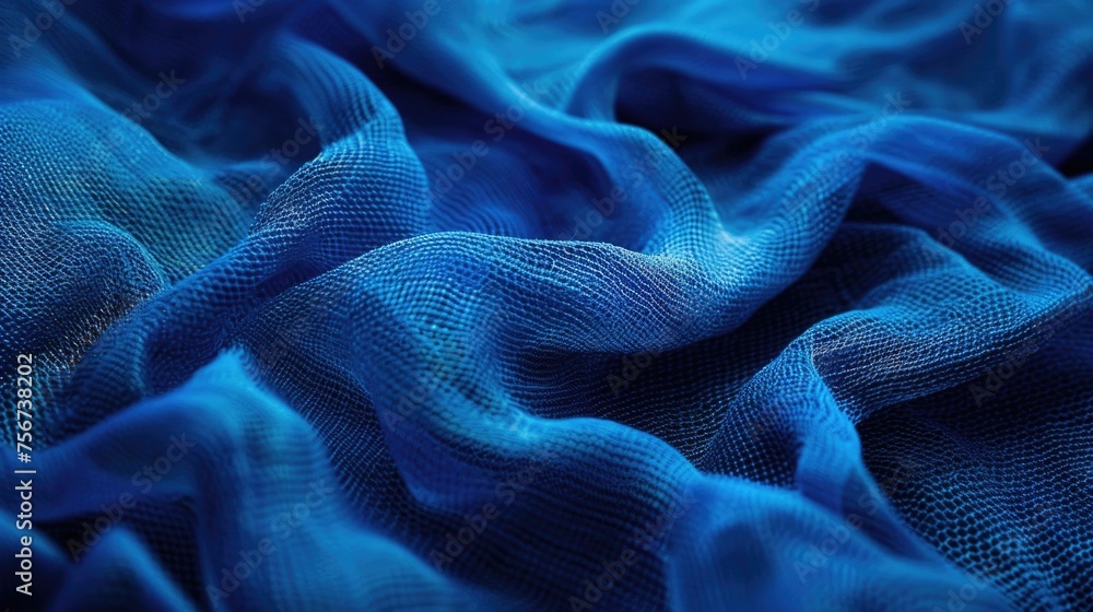 Close up shot of a vibrant blue fabric texture. Perfect for backgrounds or design projects Close up shot of a vibrant blue fabric texture. Perfect for backgrounds or design projects