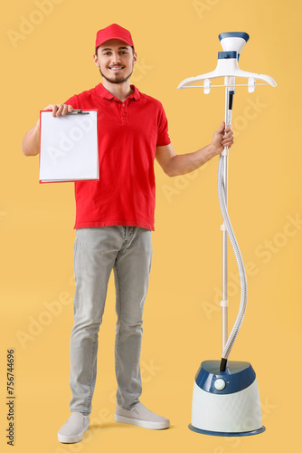 Young male courier with mod...