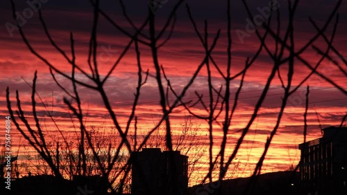  sunset silhouette and city clouds photo