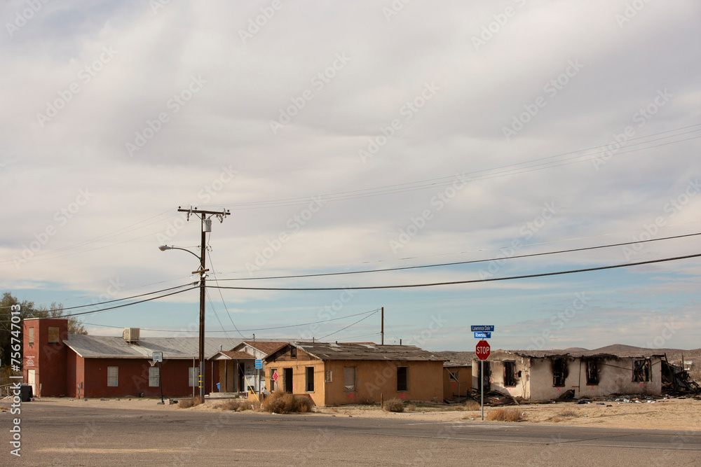 Barstow, California, USA - June 20, 2020: Afternoon sun shines on a derelict neighborhood of downtown Barstow.