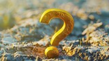 A unique golden question mark sculpture in the sand, perfect for educational or business concepts