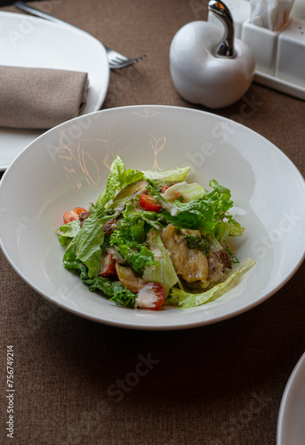 Caesar salad with a signature dressing at an exquisite restaurant.