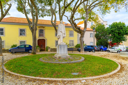 The Memorial Statue of Dr. Passos Vela, in front of the home he lived in, at a small public park in Cascais, Portugal. photo