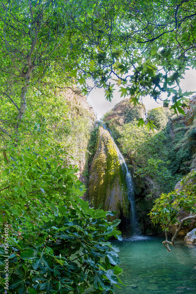 The Richtis Gorge waterfall is located in a state protected park near Exo Mouliana, Sitia, eastern Crete. The hiking trail is about 4 km in length of easy to moderate difficulty.