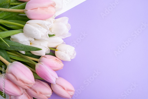 Fototapeta Naklejka Na Ścianę i Meble -  Beautiful bouquet of tulips on a light background. Place for text. Flower card