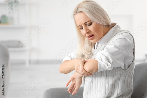 Mature woman suffering from...