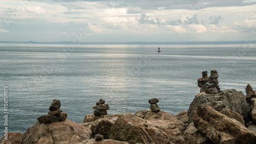 La Malbaie, Canada - August 17 2020: Stunning landscape view with the prayer stones by the saint lawrence river in La Malbaie in Quebec