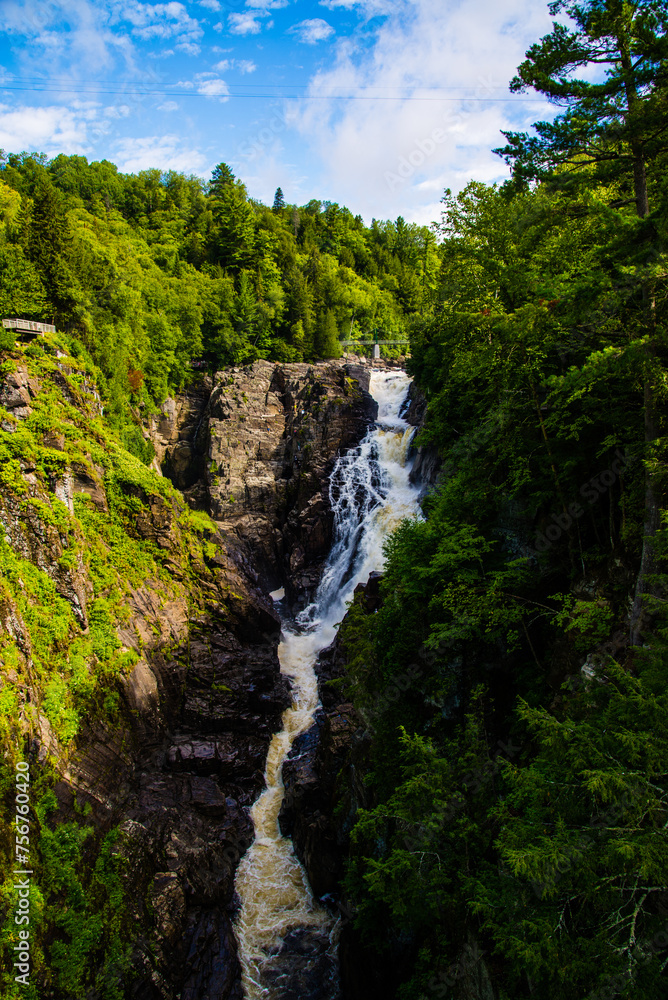 Ste-Anne Cayon, Canada - August 21 2020: The great waterfall in Ste-Anne Cayon in Quebec Ste-Anne Cayon, Canada - August 21 2020: The great waterfall in Ste-Anne Cayon in Quebec