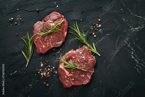 Succulent steak with aromatic rosemary on dark background. Perfect for food blogs or restaurant menus