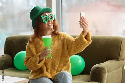 Young redhead woman in eyeg...