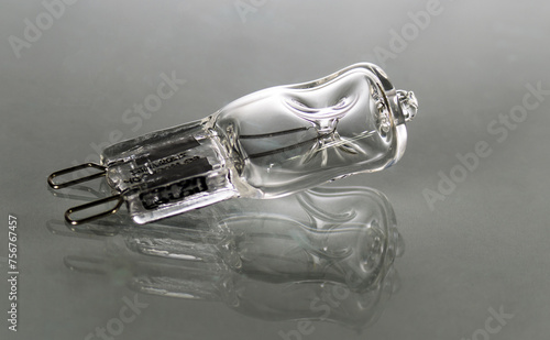 One light bulb on a gray background close-up