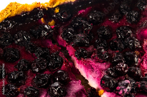 Cheesecake with black currants, background, close-up