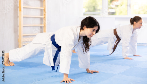 With unwavering discipline, martial artists tackled their push-up routine, striving for perfection.