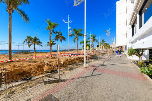 Construction work along the popular waterfront promenade at Playa Reducto, the wide sandy beach at Arrecife, Spain, on the Canary Island of Lanzarote. photo