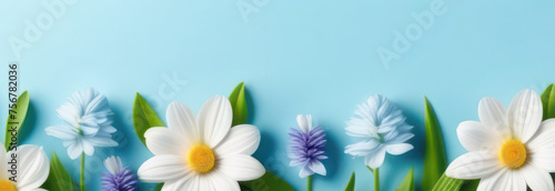 banner with spring flowers in delicate pastel colors  blue  white  green and yellow. Space for text  2 3 free background.