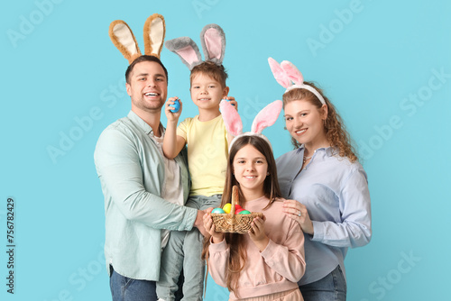 Happy family with Easter bu...